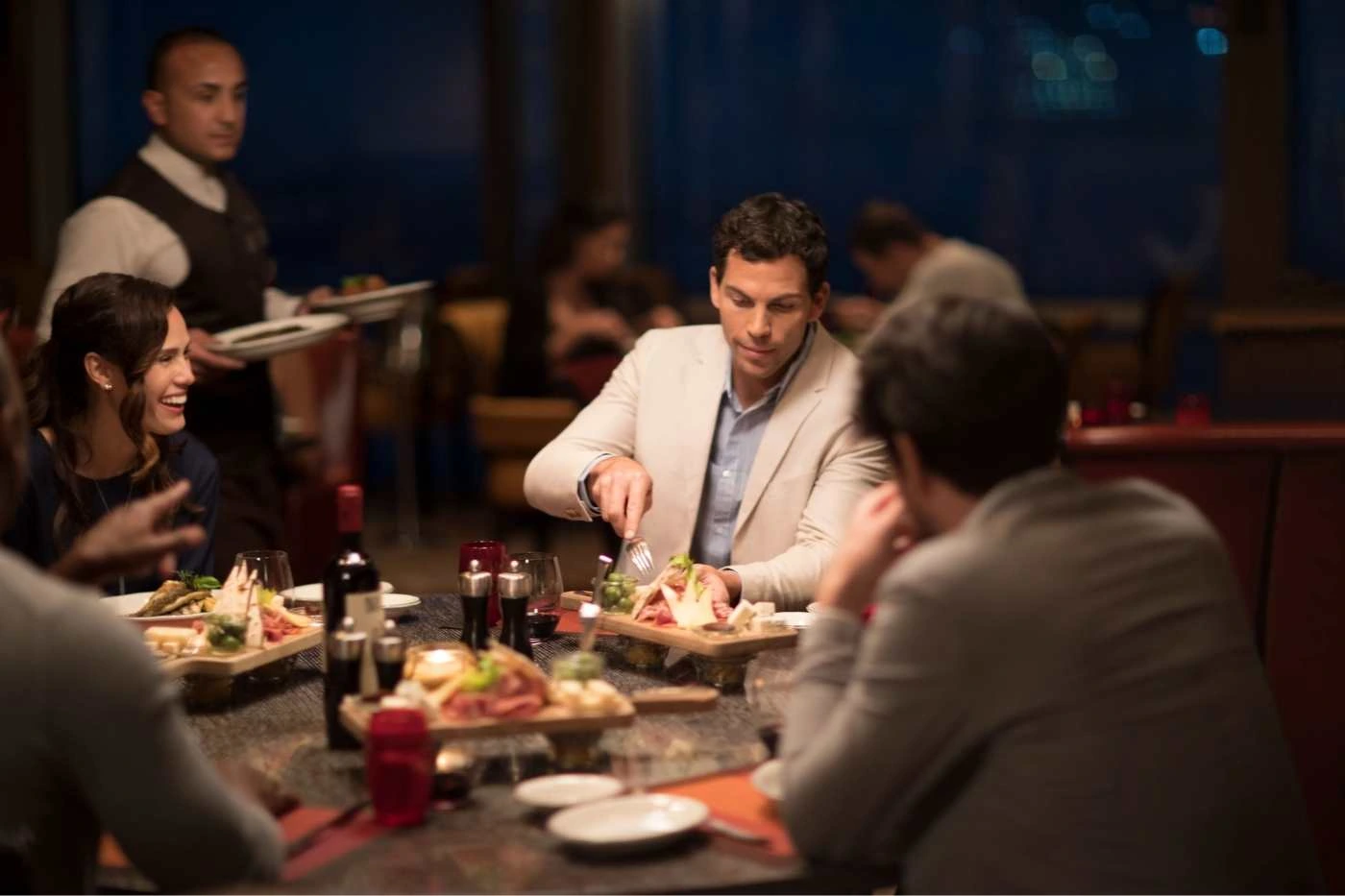 Guests enjoying a premium dining experience at sea